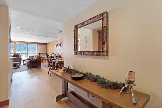 hall featuring wood finished floors