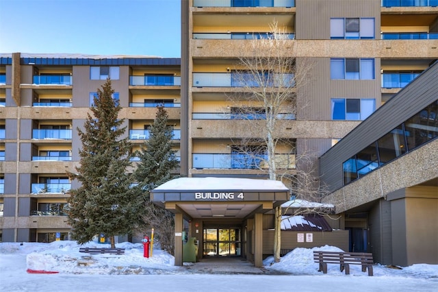 view of snow covered building