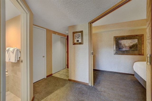 interior space with a textured ceiling