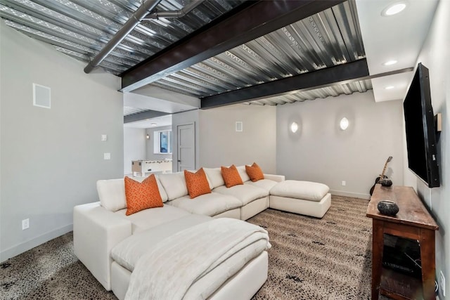 living area with beamed ceiling, recessed lighting, visible vents, and baseboards