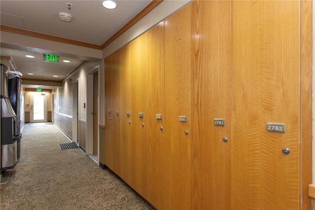 hallway featuring carpet floors, ornamental molding, and recessed lighting