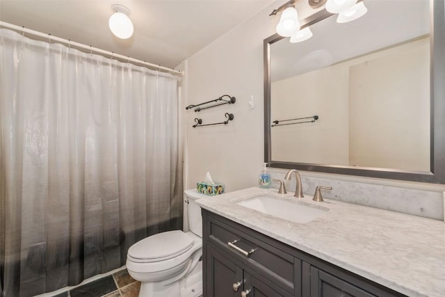 full bathroom with toilet, vanity, and shower / tub combo with curtain