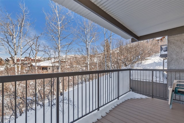 view of snow covered deck