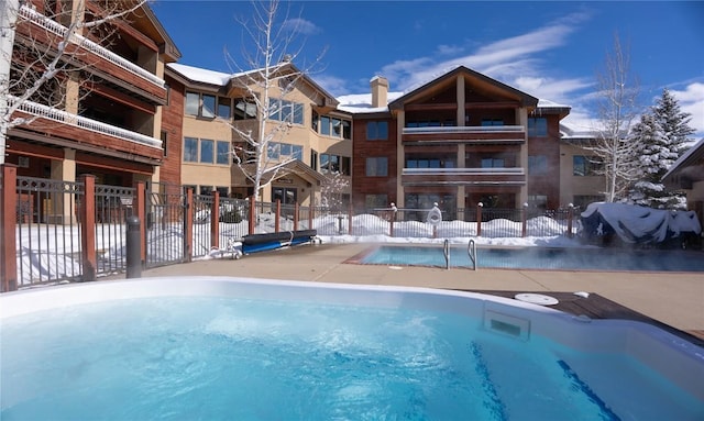 view of snow covered pool