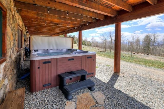 view of patio featuring a hot tub