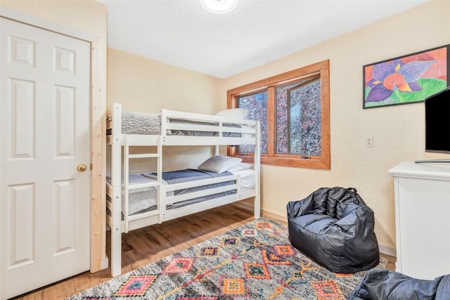 bedroom featuring hardwood / wood-style flooring