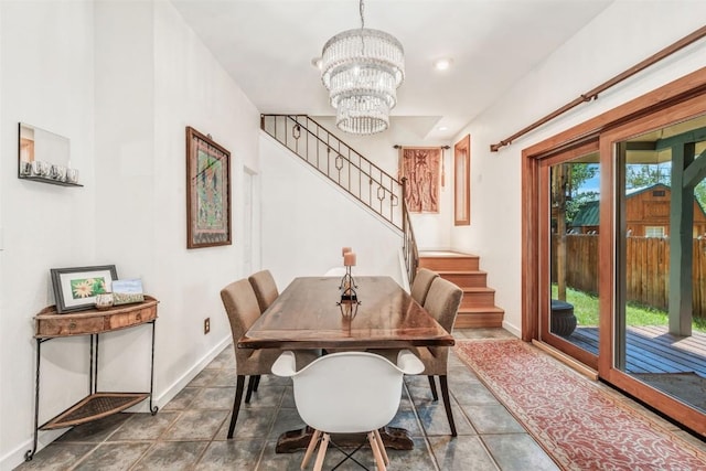 dining room with a healthy amount of sunlight and a notable chandelier