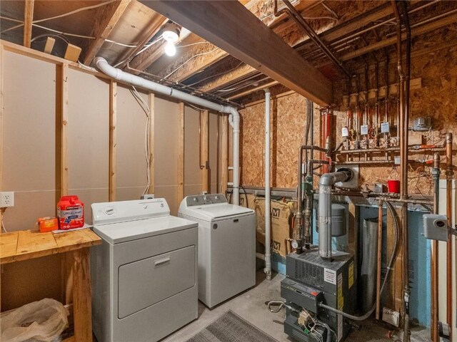 washroom with separate washer and dryer