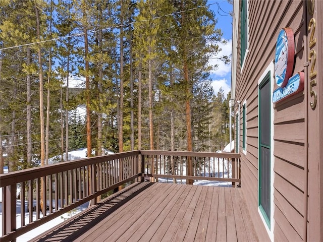 view of snow covered deck