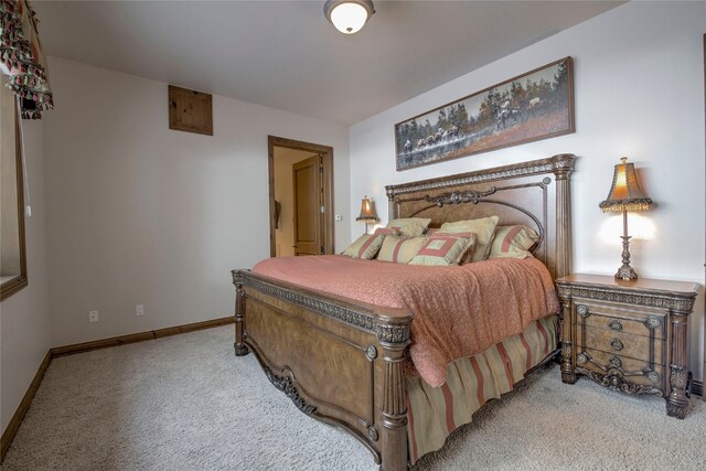 bedroom featuring light colored carpet