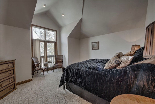 carpeted bedroom featuring vaulted ceiling