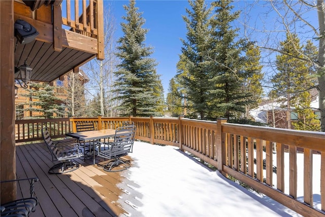 view of snow covered deck