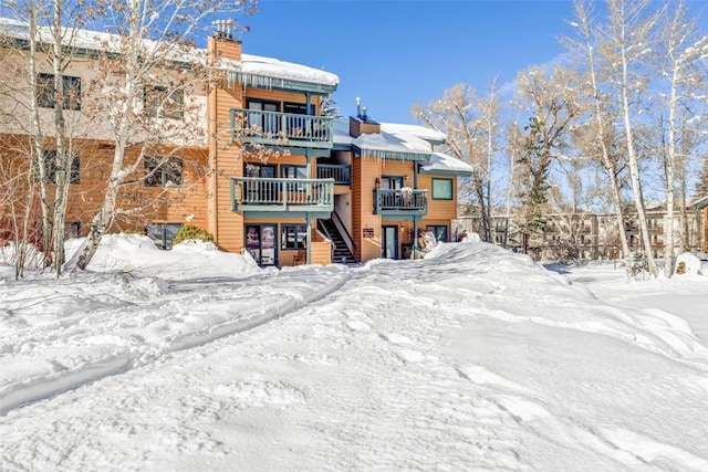 view of snow covered property