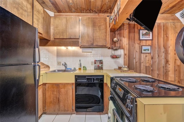 kitchen with wood ceiling, sink, light tile patterned floors, and black appliances