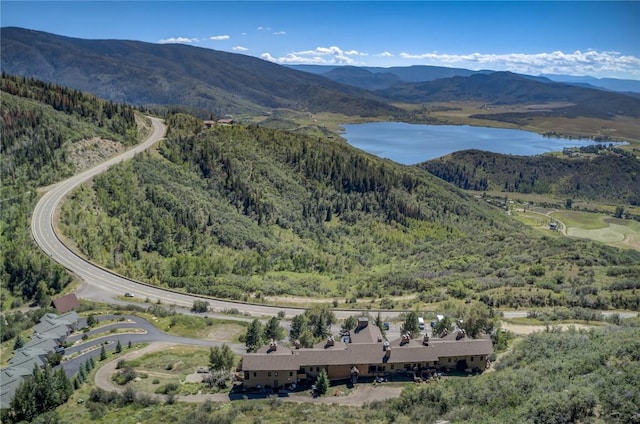 bird's eye view with a water and mountain view