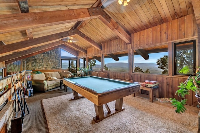 recreation room with wood ceiling, wooden walls, lofted ceiling with beams, a mountain view, and pool table