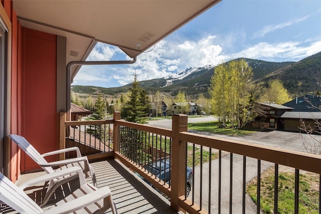 balcony featuring a mountain view