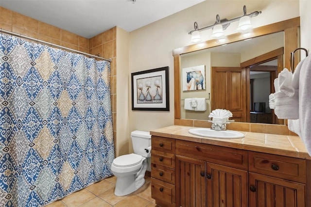 bathroom featuring toilet, tile patterned flooring, a shower with shower curtain, and vanity