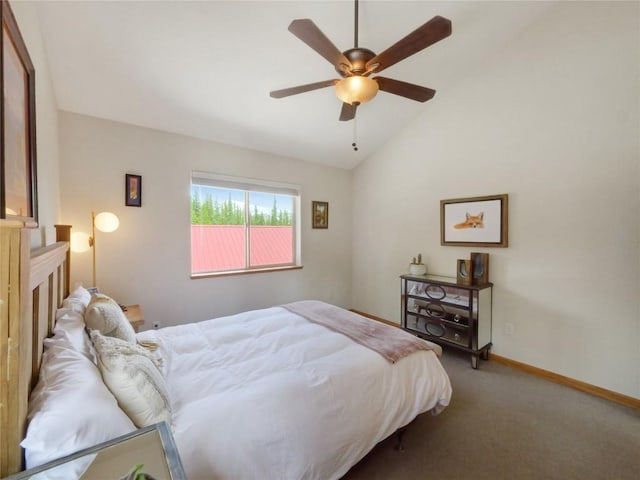 carpeted bedroom featuring vaulted ceiling and ceiling fan