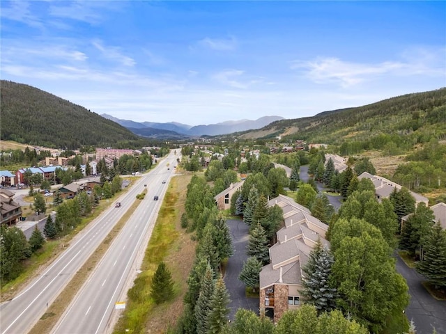 birds eye view of property with a mountain view