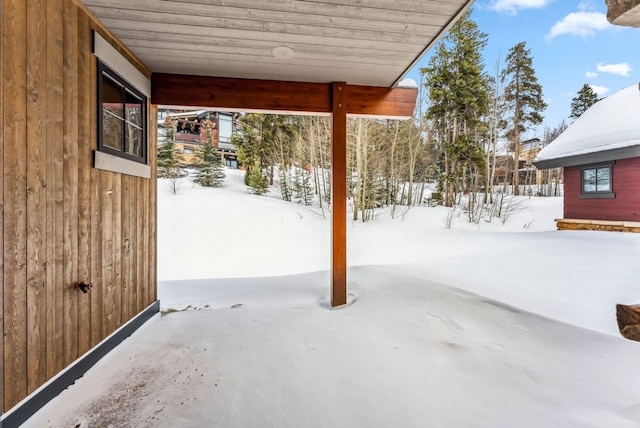 view of snow covered patio