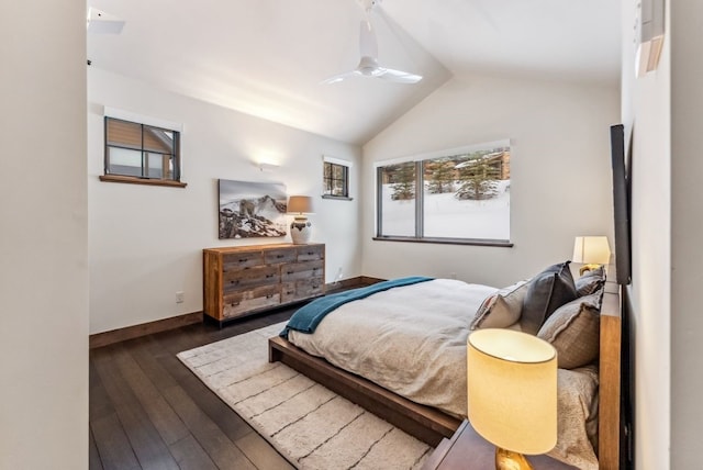 bedroom featuring dark wood-type flooring, ceiling fan, and lofted ceiling