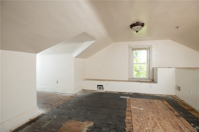 additional living space with lofted ceiling