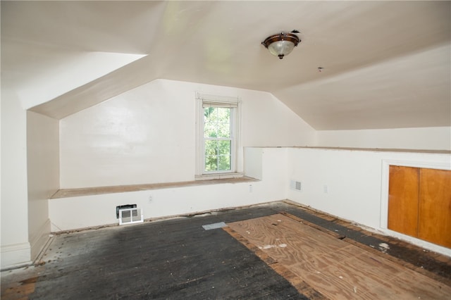 bonus room featuring lofted ceiling