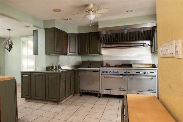 kitchen featuring decorative light fixtures, ceiling fan, light tile flooring, sink, and dark brown cabinetry