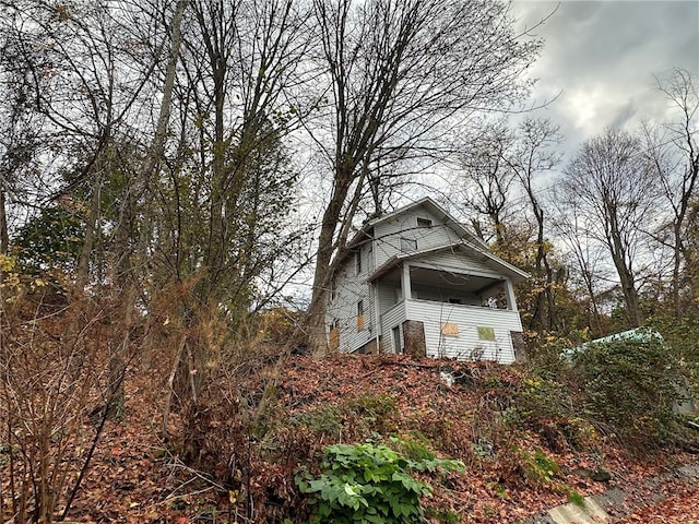 view of property exterior with a balcony