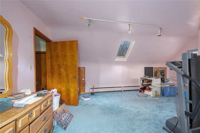 interior space featuring light colored carpet, lofted ceiling with skylight, rail lighting, and baseboard heating