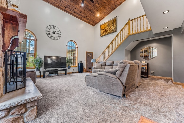 carpeted living room featuring high vaulted ceiling and wood ceiling