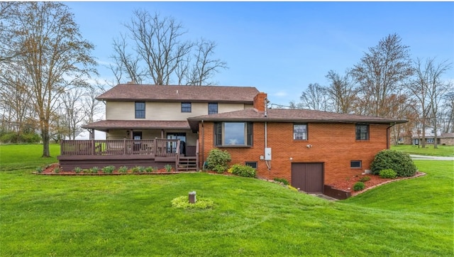 back of property with a wooden deck and a lawn