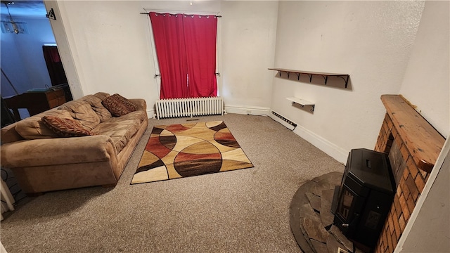 carpeted living room featuring radiator