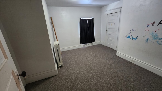 unfurnished room with radiator