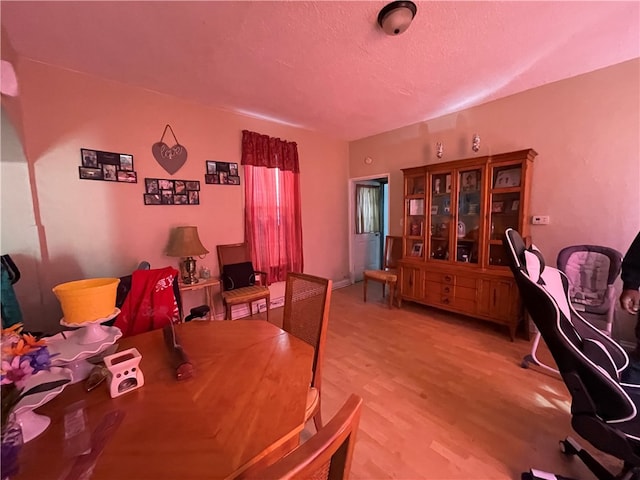 dining area featuring hardwood / wood-style floors