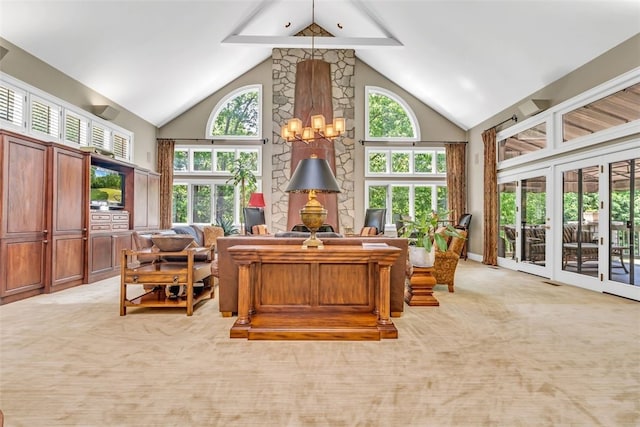 office with a notable chandelier, a wealth of natural light, light carpet, and high vaulted ceiling