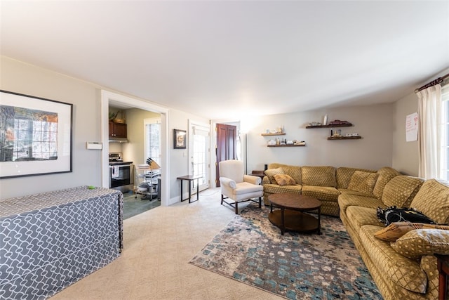 living room featuring light carpet