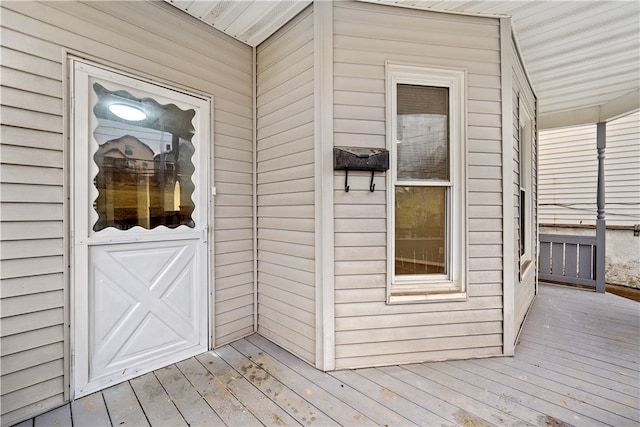 doorway to property with a deck