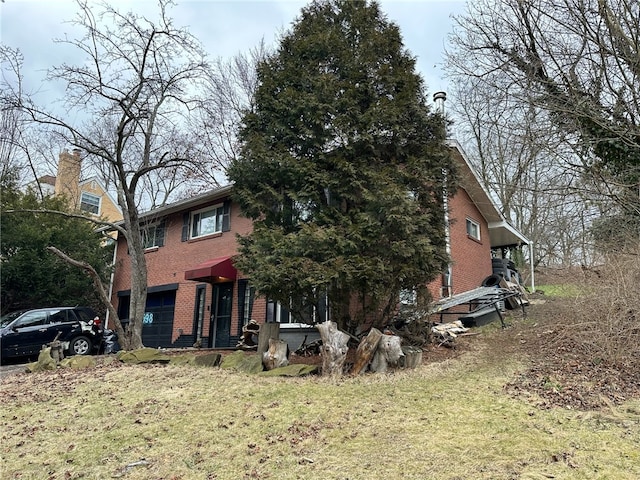 rear view of house with a yard