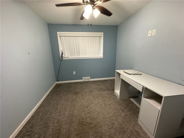 interior space with ceiling fan and dark colored carpet