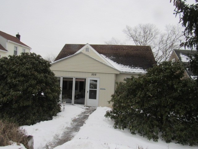 view of snow covered property