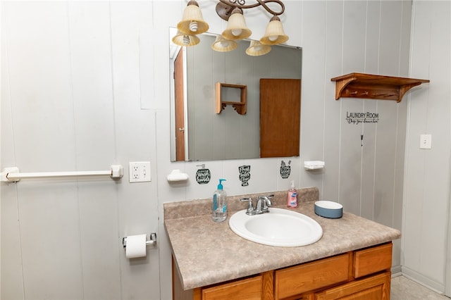 bathroom with vanity with extensive cabinet space