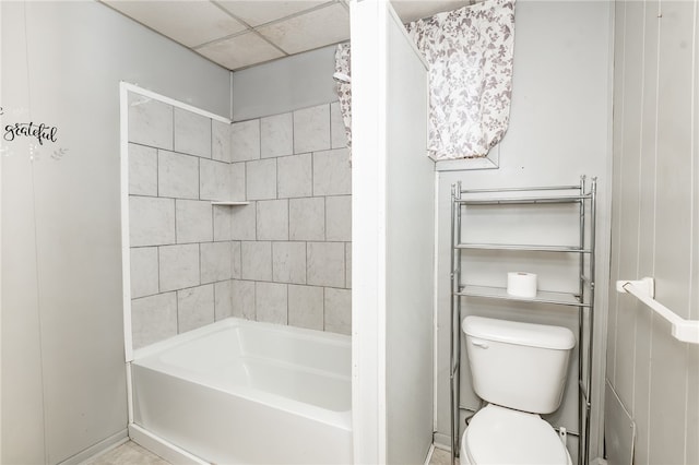 bathroom featuring toilet and shower / washtub combination