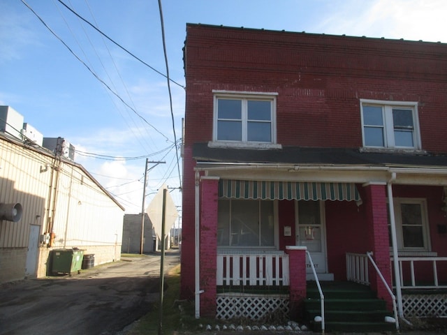 view of property with a porch