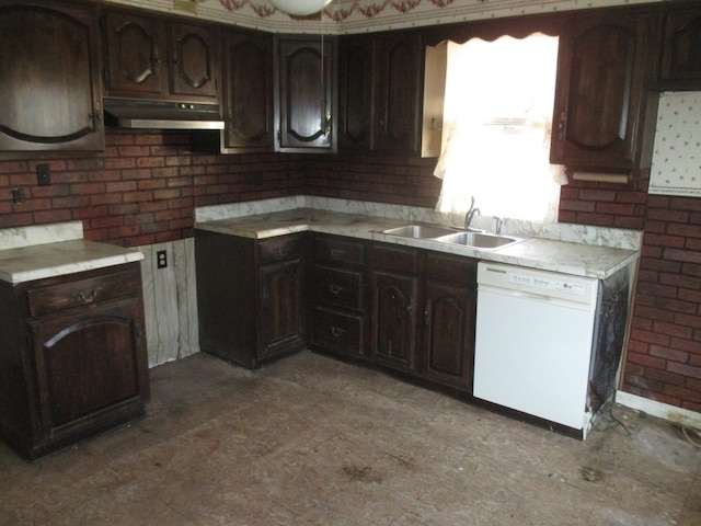 kitchen featuring sink, dark brown cabinetry, and dishwasher