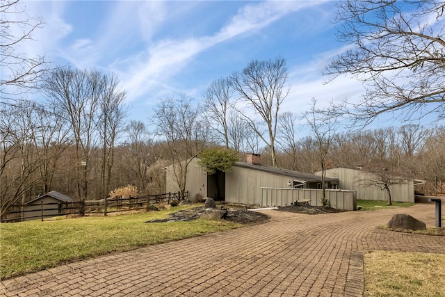 exterior space featuring a lawn