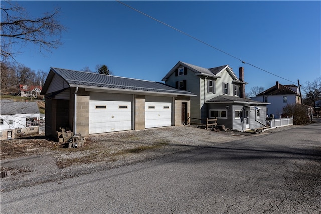 front of property with a garage