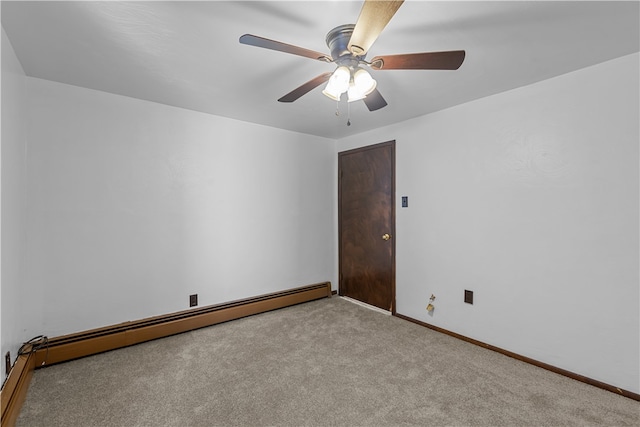 unfurnished room with light carpet, a baseboard radiator, and ceiling fan