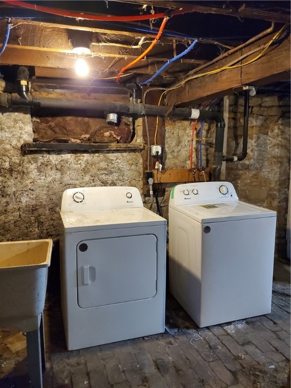 laundry area with washer and clothes dryer